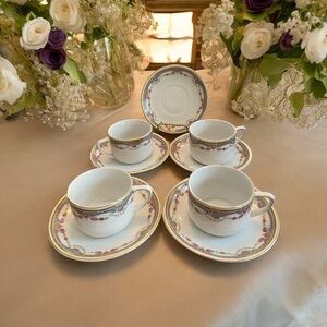 Antique porcelain teacups and saucers. 4 cups, 5 saucers.